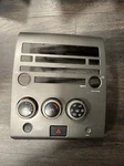 2004-2005 Nissan Titan Climate Control Radio Dash Bezel P/n: 68260 7S100. Fixed Price $179.99.