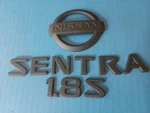 Nissan Sentra 1.8 Rear Lid Black 2004-06 Emblem Logo Badge Sign Set Oem Used. Fixed Price $25.95.